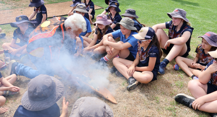 NAIDOC Day HUB Day at Girilambone Public School with students taking part in a smoking ceremony at the welcome